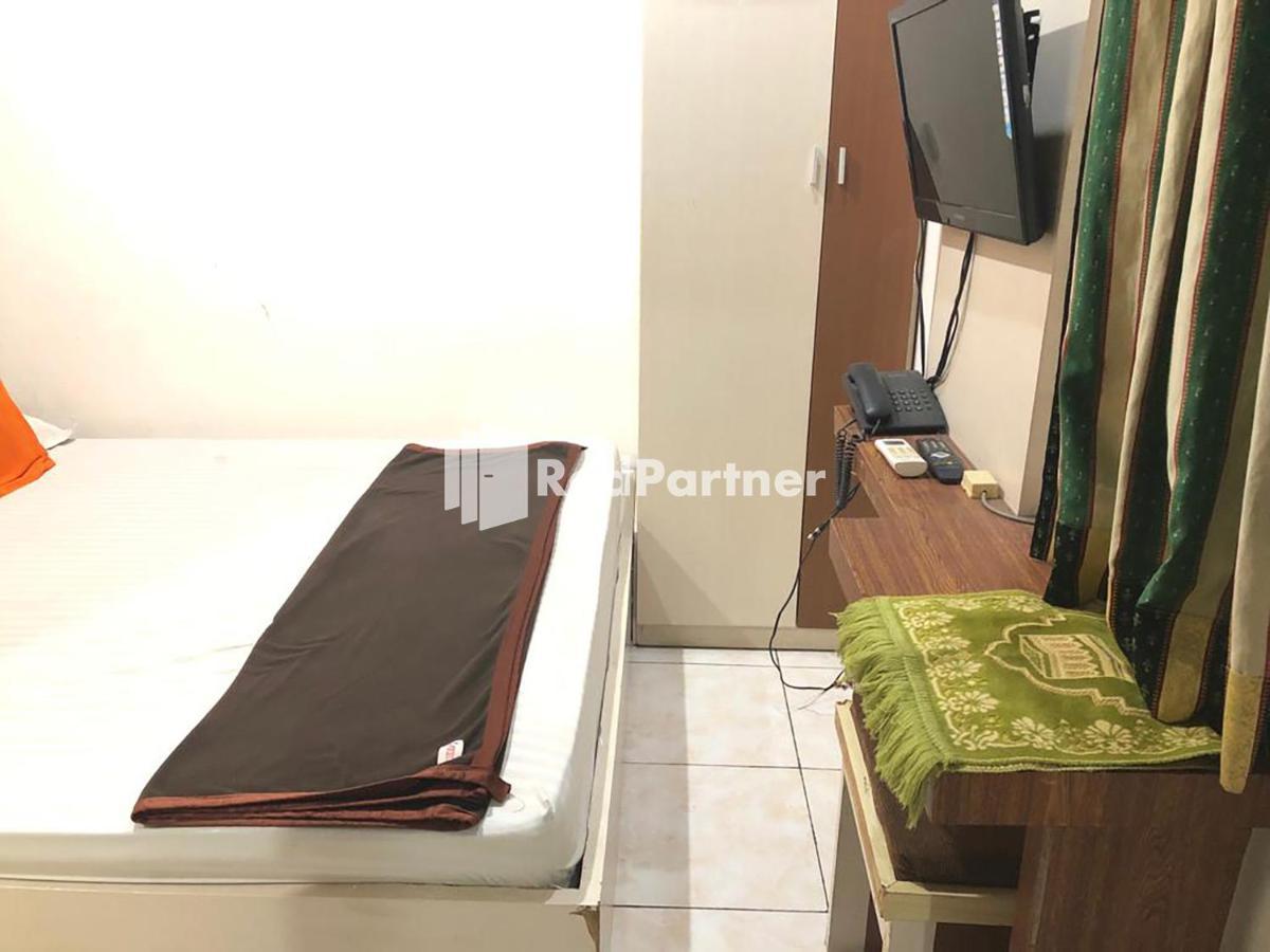 Seungit Syariah Inn Tebet Mitra Reddoorz Giacarta Esterno foto